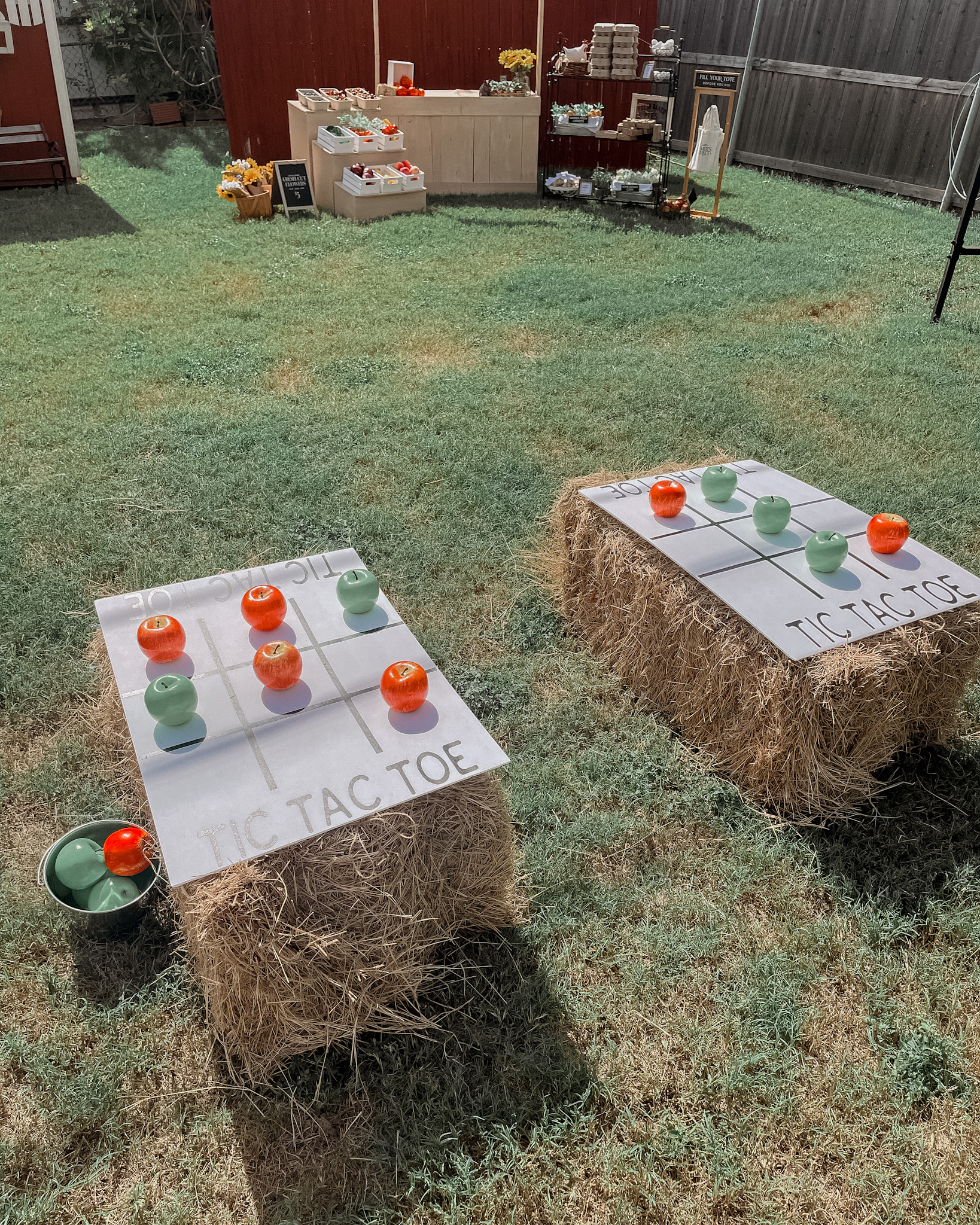 farmers market party activities, games and more! Apple tic tac toe on a hay bale
